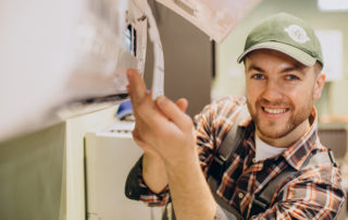 Repairman Doing Air Conditioner Servise