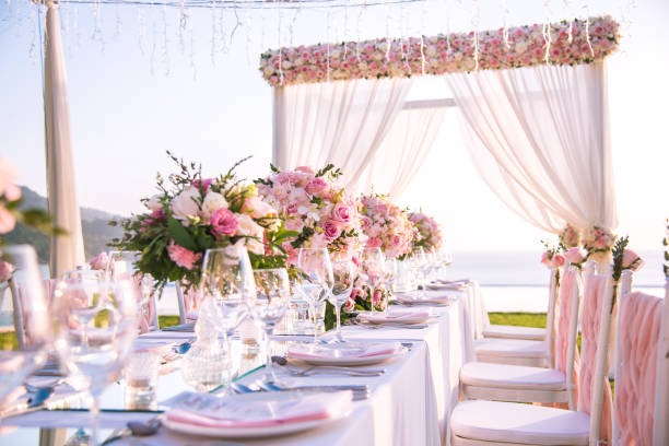 Table Setting At A Luxury Wedding And Beautiful Flowers On The Table.